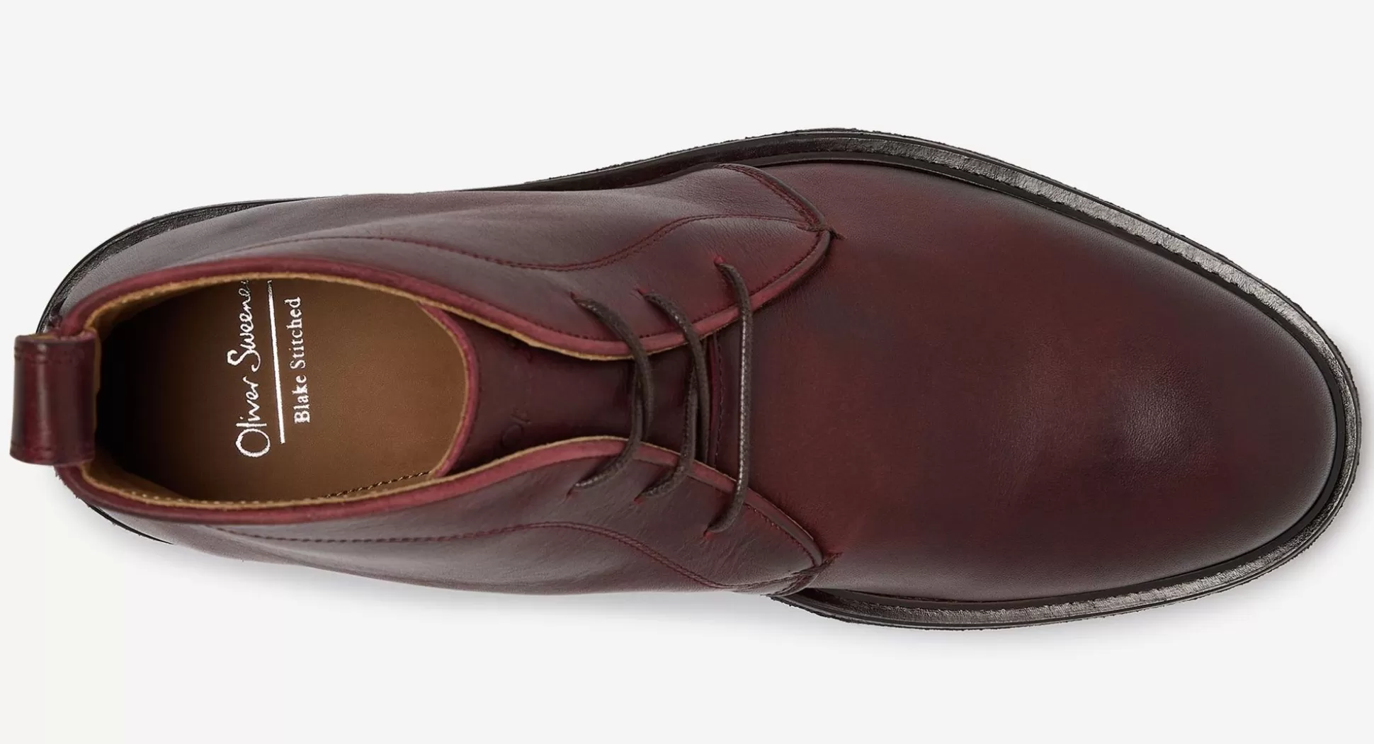Bottes Oliver Sweeney Bogada - Cuir Souple Bordeaux Élégance Intemporelle avec Empiècements Texturés 

Chaussures Haut-de-Gamme Oliver Sweeney - Modèle Bogada en Cuir Vieilli Bordeaux et Accents Métallisés 

Bottes de Ville Bogada par Oliver Sweeney - Cuir Bordeaux Patiné, Semelle Coussionnée pour Marche Urbaine 

Modèle Signature Oliver Sweeney : Bottes Bogada en Cuir Pleine Fleur Bordeaux avec Coutures Contrastées 

Collection Automne-Hiver : Bottes Montantes Bogada Oliver Sweeney - Cuir Souple Bordeaux et Doublure en Agneau