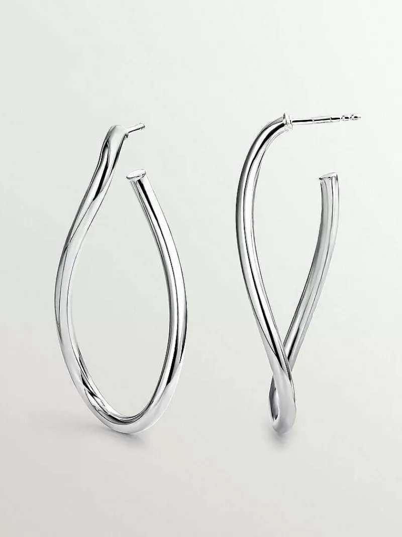 Boucles d'oreilles Aristocrazy - Grands cercles argentés à motifs vagues en argent 925 

(Note : La structure modifiée intègre des synonymes naturels comme 