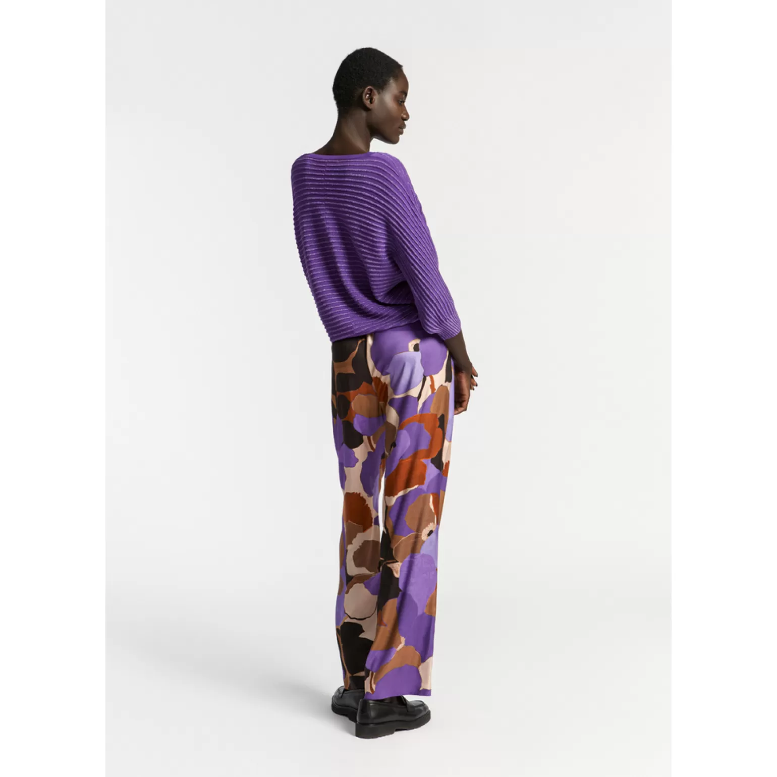 Pull élégant à motifs originaux avec reflets scintillants - Boutique Xandres