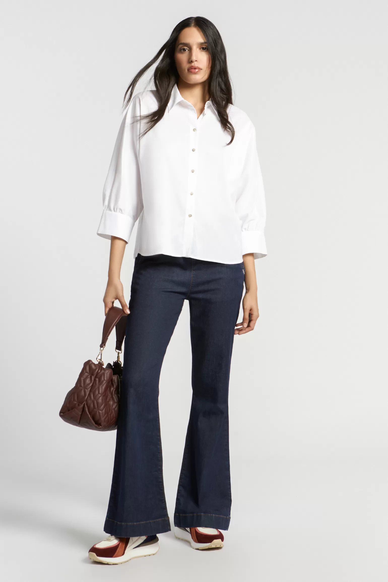 Blouse stylisée col chemisier - Coupe généreuse pour un look sophistiqué Xandres

（：，