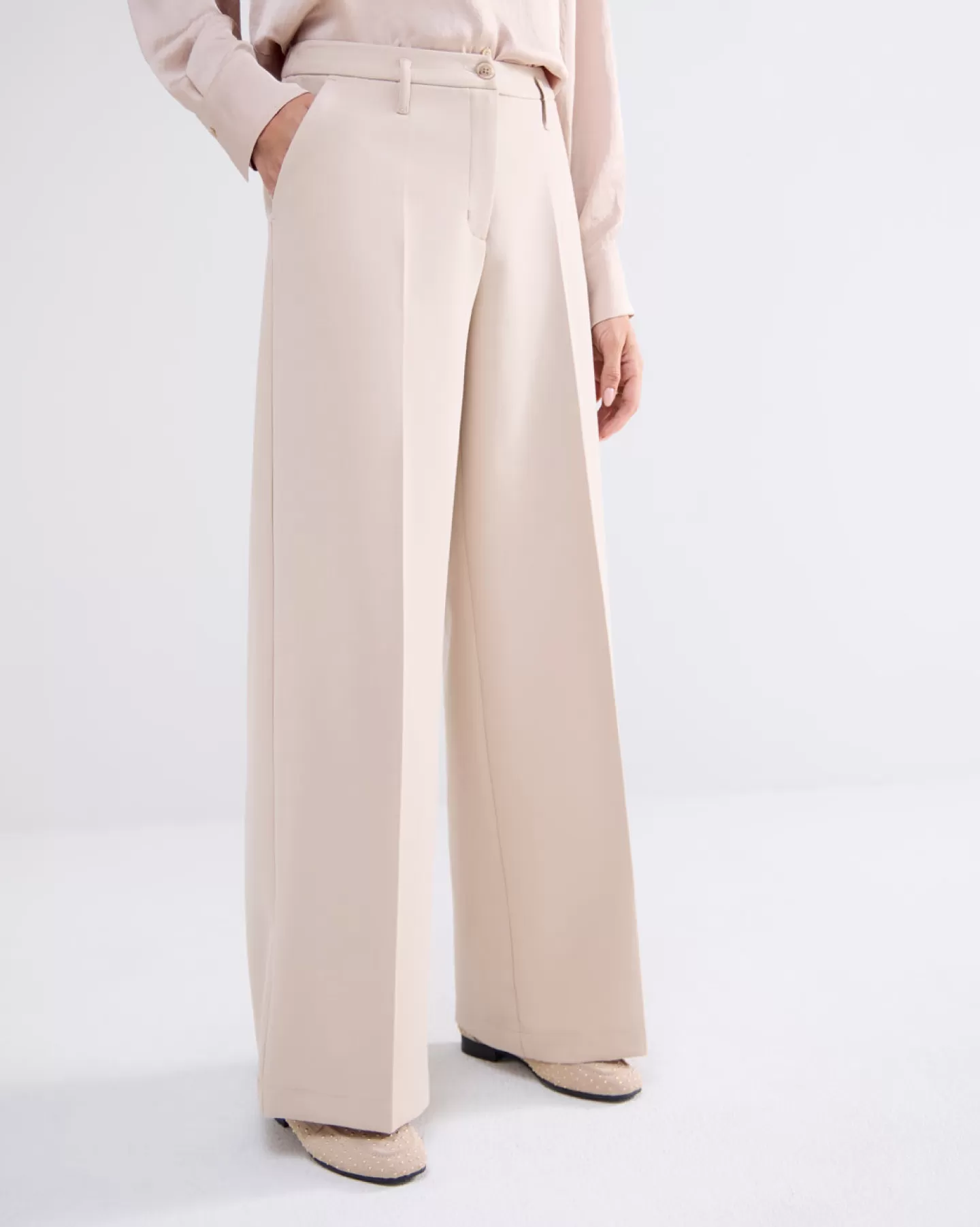 Pantalons & Combinaisons Élégants - Modèle Évasé Crème Tendance