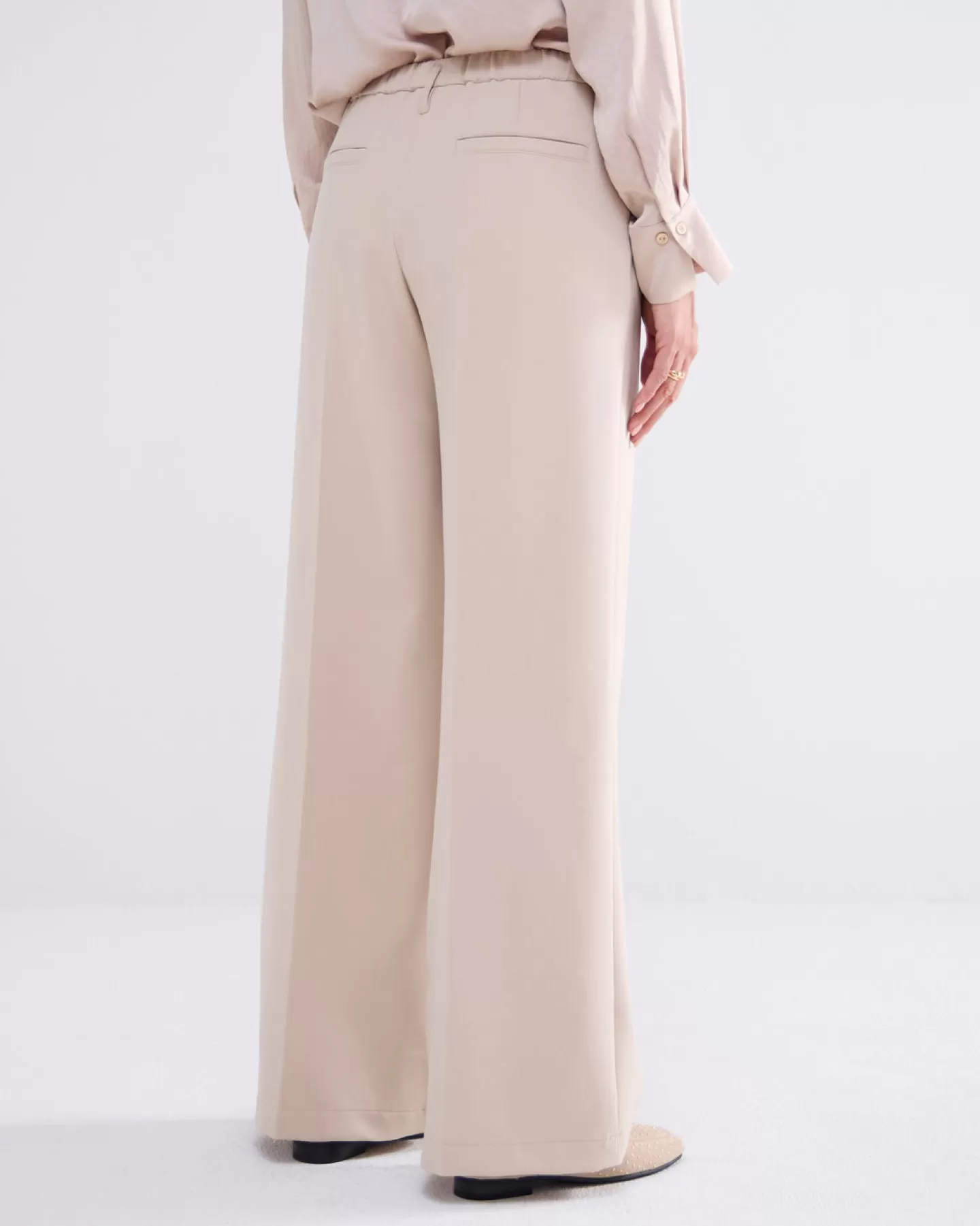 Pantalons & Combinaisons Élégants - Modèle Évasé Crème Tendance